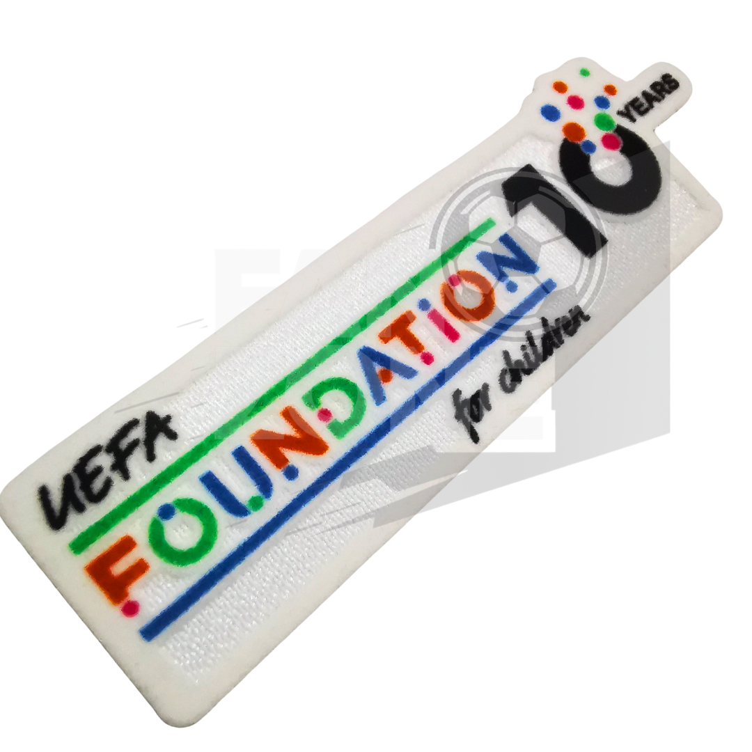 Parche UEFA FOUNDATION 10 Sporting iD adulto player issue champions league 25/26